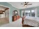 Bright main bedroom with scenic lake views, complemented by elegant furnishings at 44455 Oriole Dr # 100, Indian Land, SC 29707