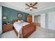 Spacious main bedroom features a serene color palette and an adjacent bathroom at 44455 Oriole Dr # 100, Indian Land, SC 29707