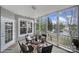 Relaxing screened porch offering scenic views of the nearby lake at 44455 Oriole Dr # 100, Indian Land, SC 29707