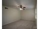 This bedroom boasts neutral carpet, a ceiling fan and a large window with natural light at 4609 Hedgemore Dr # I, Charlotte, NC 28209