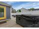 Hot tub on a fenced in patio in the backyard at 4808 Truscott Rd, Charlotte, NC 28226