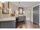 Bright bathroom boasts dual sinks, a vanity, and recessed lighting at 4808 Truscott Rd, Charlotte, NC 28226
