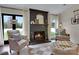 Inviting living room boasts a fireplace, decorative accents, and natural light at 4808 Truscott Rd, Charlotte, NC 28226