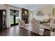 Cozy living room features a fireplace, large windows, and comfortable seating at 4808 Truscott Rd, Charlotte, NC 28226
