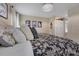 This main bedroom features a plush bed with luxury pillows and a walk-in closet at 4808 Truscott Rd, Charlotte, NC 28226