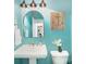 Bathroom features a stand sink, mirror and nautical themed decor at 5172 Norway Rd, Rock Hill, SC 29732