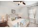 Well lit bedroom showcases a metal bed frame with accent pillows and matching bedside tables at 5172 Norway Rd, Rock Hill, SC 29732