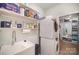 Laundry room features stacked washer and dryer, and built in shelving at 5172 Norway Rd, Rock Hill, SC 29732