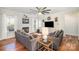 Spacious living room boasting hardwood floors, fireplace, and large comfortable sofas at 5172 Norway Rd, Rock Hill, SC 29732