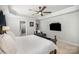 Spacious main bedroom features a fan and adjoining bathroom at 5172 Norway Rd, Rock Hill, SC 29732