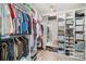 Walk-in closet features custom shelves for shoes, clothing and accessories at 5172 Norway Rd, Rock Hill, SC 29732