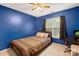 Bedroom featuring carpeted flooring, ample natural light, ceiling fan and furniture at 5519 Burning Ridge Dr, Monroe, NC 28110