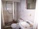 Bathroom in need of repair and cleanup with stained fixtures and walls at 605 W Elm St, Shelby, NC 28150
