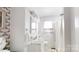 Clean bathroom with a shower/tub combo, sink, and neutral colors at 608 Forney Ave, Lincolnton, NC 28092