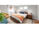 Cozy bedroom with neutral walls, natural lighting, and hardwood floors at 6100 Rose Valley Dr, Charlotte, NC 28210