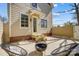 Backyard patio area with a modern fire pit and stylish outdoor seating at 68 Cabarrus W Ave, Concord, NC 28025