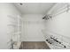 Well-organized closet space with ample shelving and storage for clothing at 68 Cabarrus W Ave, Concord, NC 28025