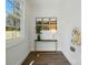 Hallway with console table, artwork, and wood floors providing style and function at 68 Cabarrus W Ave, Concord, NC 28025