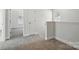Upstairs hallway with carpet and neutral paint for a clean, modern look at 68 Cabarrus W Ave, Concord, NC 28025