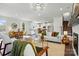 Inviting living area with modern decor, an adjacent dining space, and an open kitchen at 68 Cabarrus W Ave, Concord, NC 28025
