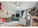 Bright bedroom with a ceiling fan, playful decor, and ample space for a belongings at 6800 Deanwood Pl, Charlotte, NC 28217