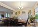 Inviting dining area with a wooden table and decorative floral accents at 6800 Deanwood Pl, Charlotte, NC 28217