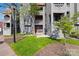 Attractive townhome exterior with cedar shake siding and lush lawn at 9025 J M Keynes Dr # 69, Charlotte, NC 28262