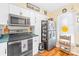 Stylish kitchen featuring stainless steel appliances and ample counter space at 9025 J M Keynes Dr # 69, Charlotte, NC 28262