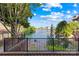 Serene community view from patio overlooking a tranquil lake at 9025 J M Keynes Dr # 69, Charlotte, NC 28262