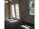 Bedroom with sliding glass doors, providing natural light at 9156 Black Heath Cir, Charlotte, NC 28214