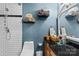 Modern bathroom with shower, vanity with glass sink, and updated fixtures at 1008 Autumn Ln, Concord, NC 28025
