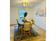 Cozy dining area featuring a charming table set and stylish decor with natural light at 1031 Lester Trl, Iron Station, NC 28080