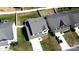 Aerial view of a well-maintained home surrounded by green lawns and neighboring houses at 10848 Tailwater St, Davidson, NC 28036