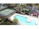 Community pool with tennis courts, a clubhouse, mature landscaping and parking at 10848 Tailwater St, Davidson, NC 28036