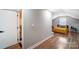 Bedroom has hardwood floors, sloped ceiling, natural light and comfortable bed at 1110 S New Hope Rd, Gastonia, NC 28054