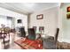 Stylish dining room area featuring hardwood floors, natural light, and an open view to the living room at 1110 S New Hope Rd, Gastonia, NC 28054