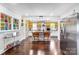 Bright, open kitchen features stainless appliances and a center island with bar seating at 1110 S New Hope Rd, Gastonia, NC 28054