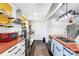 Updated kitchen with butcher block countertop, stainless steel appliances, and ample cabinet space at 1110 S New Hope Rd, Gastonia, NC 28054