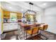 Bright kitchen with stainless steel appliances, a central island with seating, and sleek modern finishes at 1110 S New Hope Rd, Gastonia, NC 28054