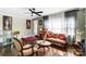 Inviting living area with hardwood floors, bright natural light, neutral wall color, and elegant furnishings at 1110 S New Hope Rd, Gastonia, NC 28054
