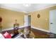 Bright living room with hardwood floors, white trim, and stylish decorations at 1110 S New Hope Rd, Gastonia, NC 28054