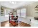 Bright home office featuring wood floors, a desk, and a window for natural light at 1110 S New Hope Rd, Gastonia, NC 28054
