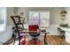 Well-lit home office with a large desk, ample workspace, and natural light from the window at 1110 S New Hope Rd, Gastonia, NC 28054
