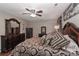 Spacious bedroom featuring elegant furniture, a ceiling fan, and a decorative 'Sweet Dreams' wall art at 1135 Valley St, Statesville, NC 28677