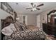 Comfortable bedroom with a ceiling fan, elegant decor, and plenty of natural light at 1135 Valley St, Statesville, NC 28677