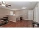 Versatile bonus room with hardwood floors, ceiling fan, and ample space for activities at 1135 Valley St, Statesville, NC 28677