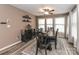Well-lit dining room featuring an elegant dining set, decorative shelves, and stylish accents at 1135 Valley St, Statesville, NC 28677