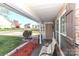Cozy front porch featuring stone accents, seating and a view of the surrounding neighborhood at 1135 Valley St, Statesville, NC 28677