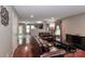 Open concept living room with hardwood floors and abundant natural light at 1135 Valley St, Statesville, NC 28677