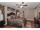 Cozy main bedroom featuring a decorative bed frame and an ensuite bathroom at 1135 Valley St, Statesville, NC 28677